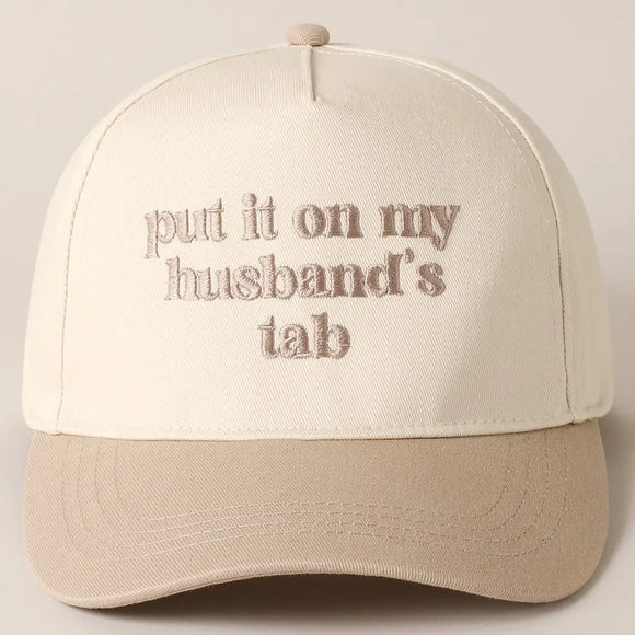 Put It On My Husbands Tab Trucker Hat- Beige