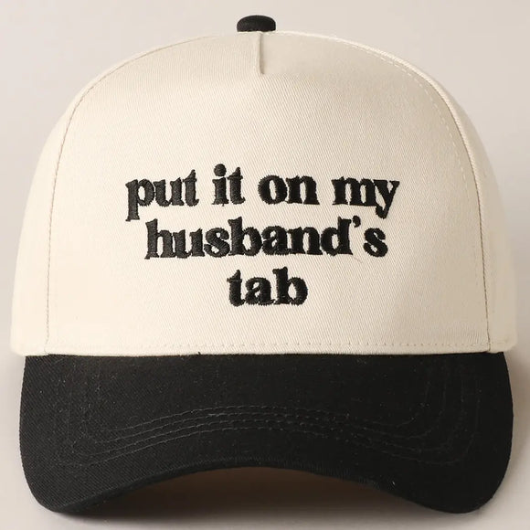 Put It On My Husbands Tab Trucker Hat- Black