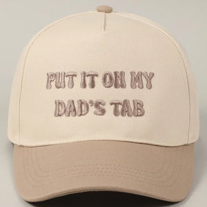 Put It On My Dads Tab Trucker Hat- Beige