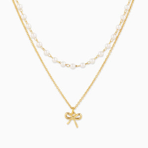 Double Layered Pearl Chain and Bow Pendant Necklace